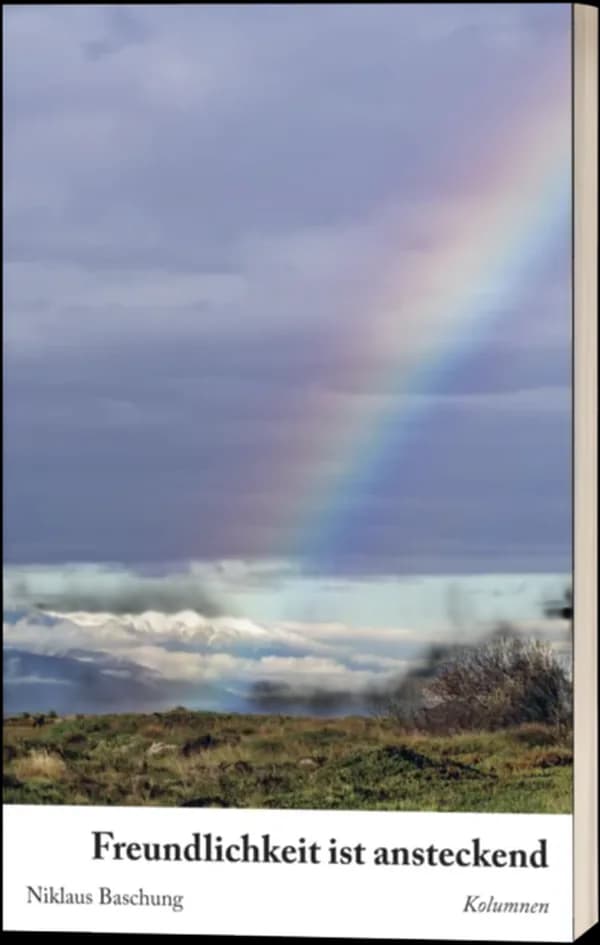 Buchcover «Freundlichkeit ist ansteckend»: ein Regenbogen über einer Landschaft
